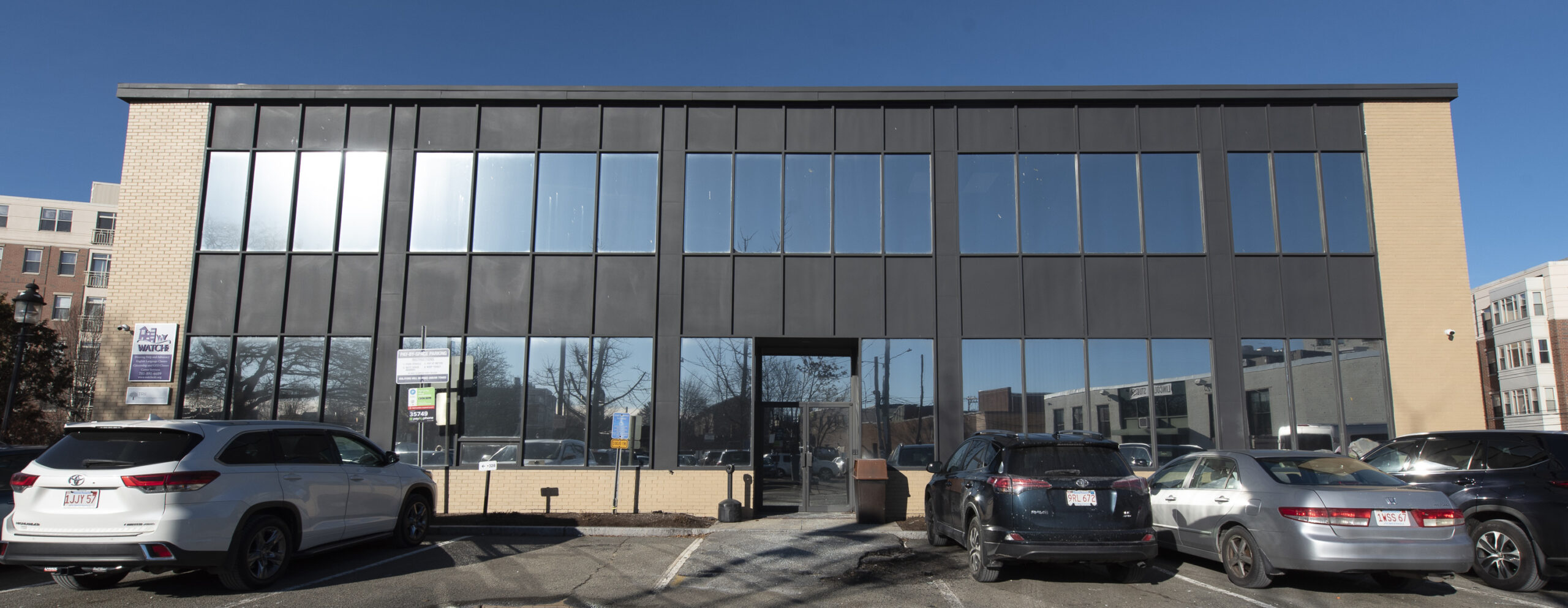 rear parking lot for office building at 24 Crescent Street in Waltham MA